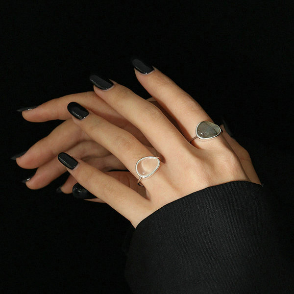 A minimalist, design-centric, and versatile S925 sterling silver open ring for women with moonstone crystal inlay.